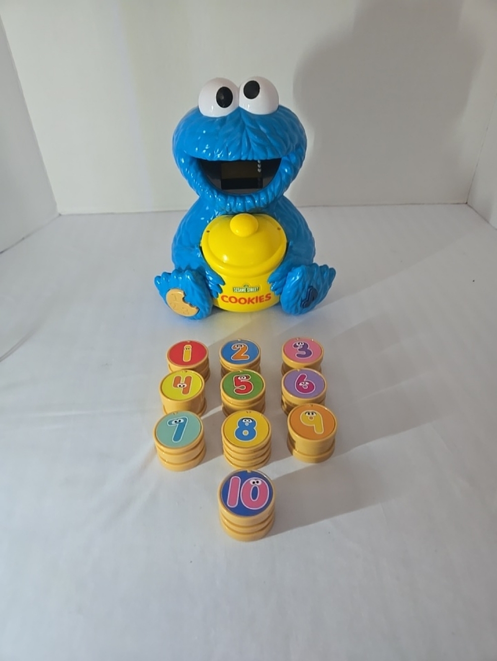 Sesame Street Blue Cookie Monster with Yellow Cookie Jar and Numbered Tokens